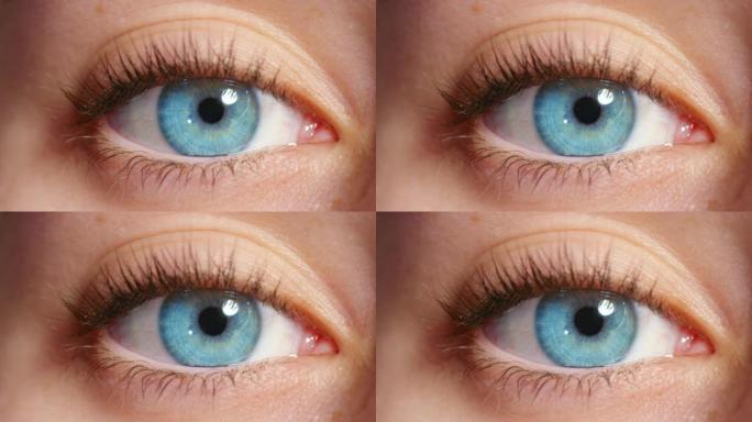 在验光师或配镜师的测试中，女人的蓝眼睛眨眼的眼睛，视力和视力。用女性进行处方眼镜或隐形眼镜的视力，测