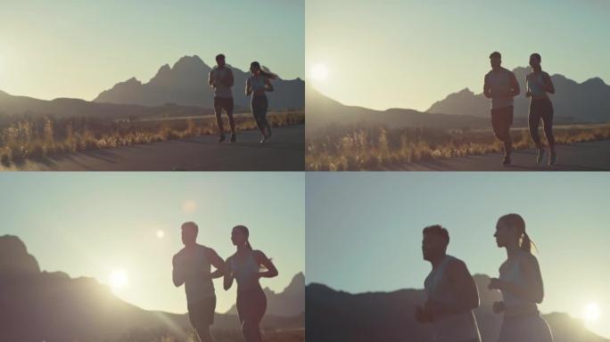 一对年轻夫妇在乡村道路上奔跑的4k视频片段