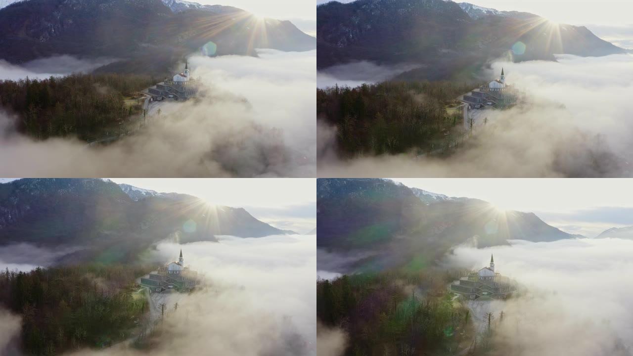 空中WS村庄被云层覆盖