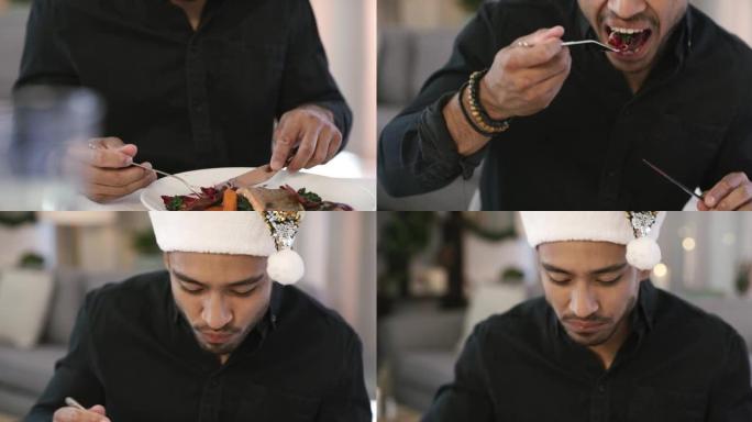 一个男人在家吃美味圣诞大餐的4k视频片段