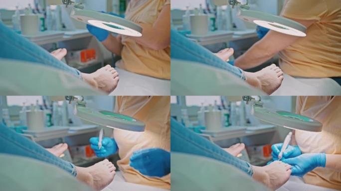 SLO MO修脚师在对年轻女性的脚进行修脚时使用电动工具