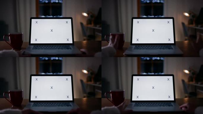 POV无法识别的女人在带有色度键屏幕的笔记本电脑上进行视频通话
