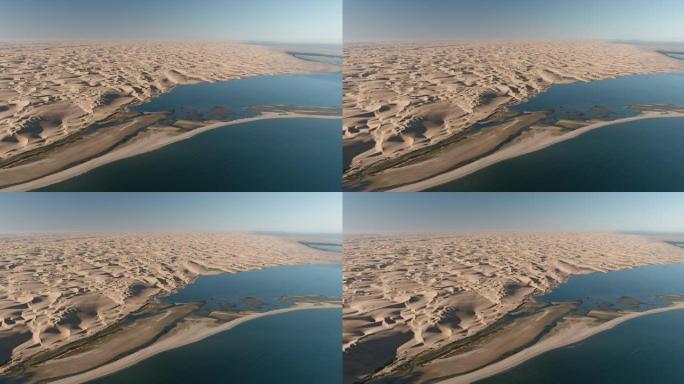桑威奇港的高鸟瞰图，无尽的沙丘在纳米布沙漠中与大西洋交汇