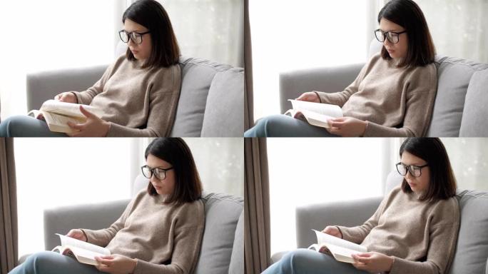 女人在家放松时看书