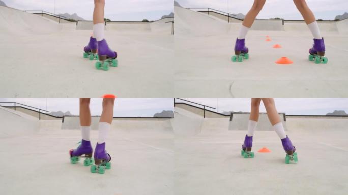 在滑板公园外面的女性腿轮滑特写镜头。熟练的溜冰者女孩或快速穿过球果的人。穿着老式彩色旱冰鞋练习体育比