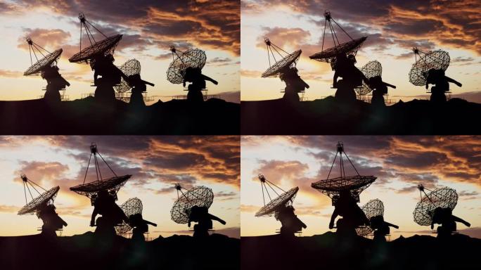 大型射电望远镜在彩色的日落天空下接收信息以获取屏幕保护程序