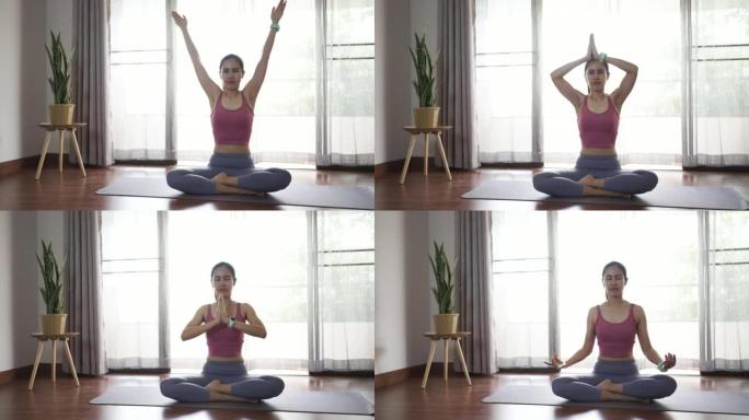 女人在家里的客厅里练习瑜伽课