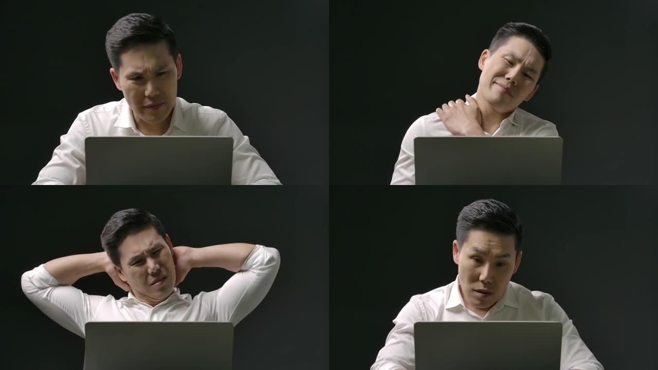 年轻英俊的亚洲男人在网上使用笔记本电脑工作或学习时很累。检疫期间，家里穿着白衬衫脸严肃的家伙。社会距