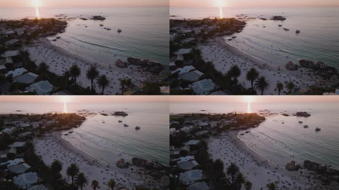 南非开普敦日落时克利夫顿海滩的空中圆形视图