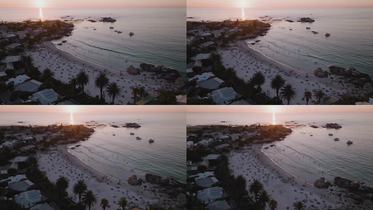 南非开普敦日落时克利夫顿海滩的空中圆形视图