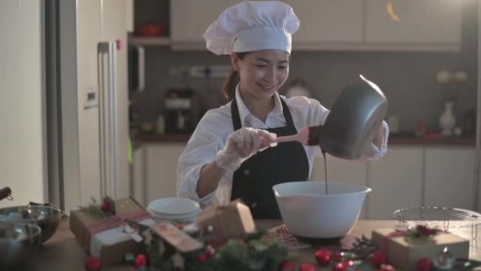 慢动作亚洲中国甜点厨师烹饪准备和搅拌巧克力配料准备脆饼圣诞庆典