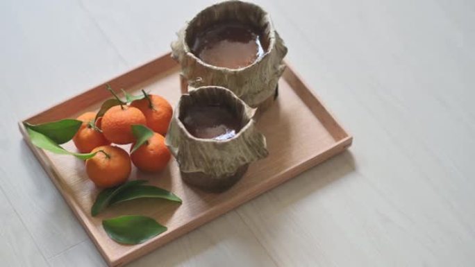 农历新年传统食品粘糕年糕配橘子
