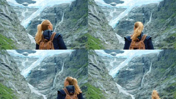 4k视频片段，一个无法识别的女人欣赏布里克斯达尔冰川的山景