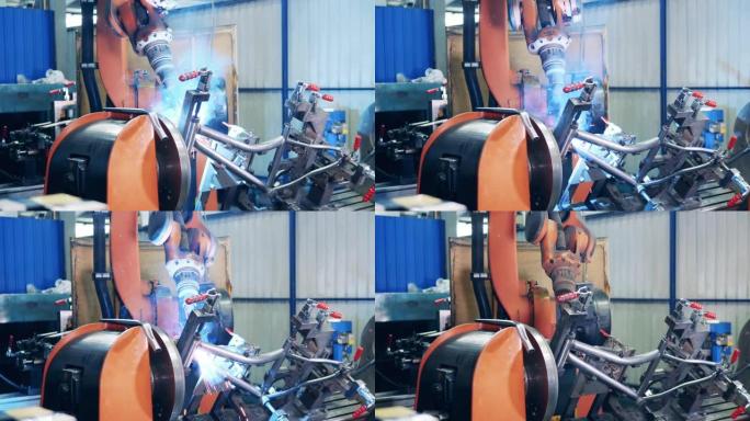 自动化机器正在焊接自行车车身框架
