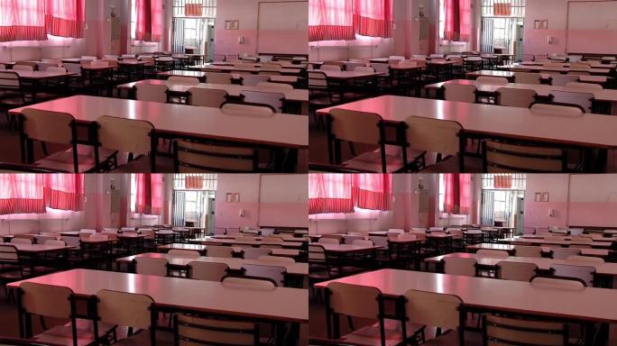 阿根廷布宜诺斯艾利斯一所公立学校食堂的空桌子。