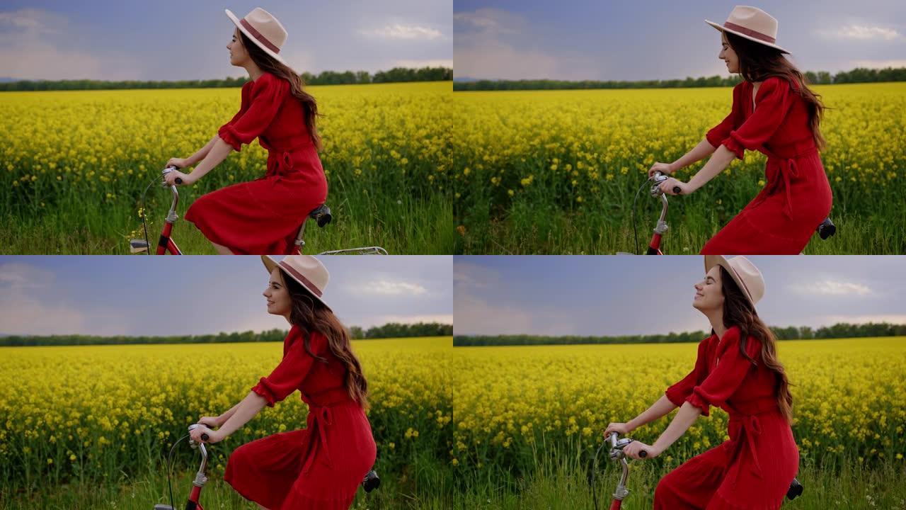 追踪，一位黑发女性骑着自行车穿过充满活力的黄色金鱼草花朵，穿着红色连衣裙和米色帽子的侧视图