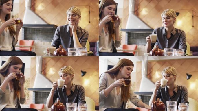 两名迷人的女商人坐在咖啡馆里的4k录像