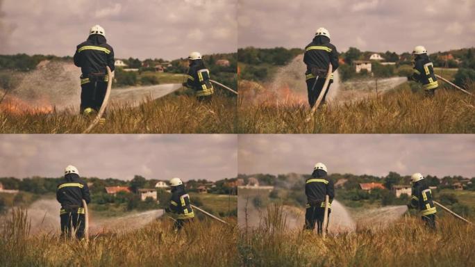 消防员在草地上灭火