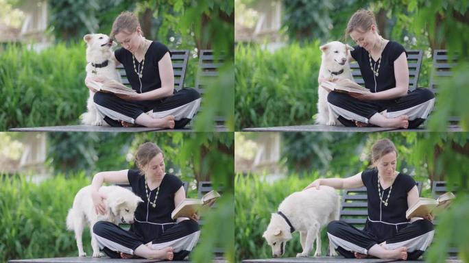女人在周末和她的狗一起看书
