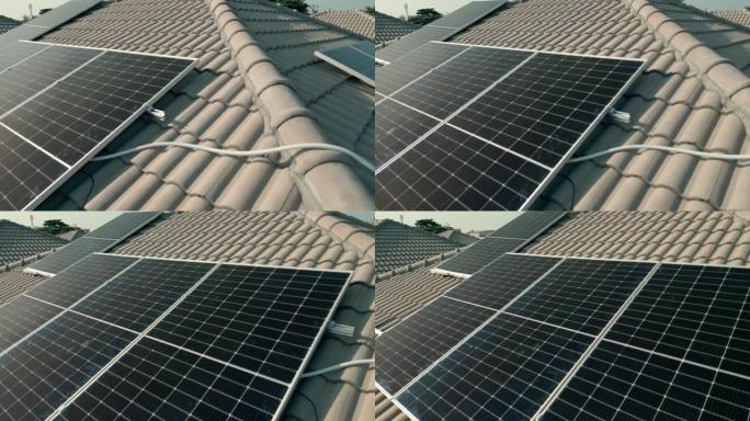 带太阳能屋顶的房子的鸟瞰图。清洁能源