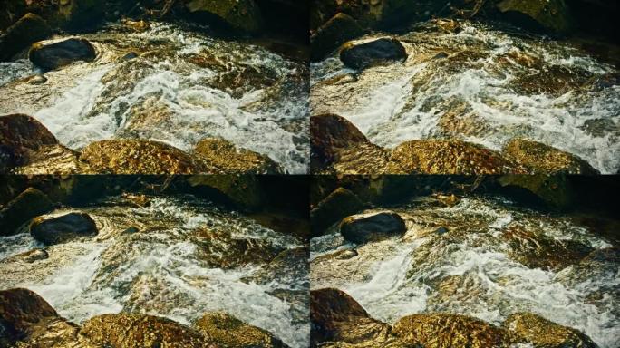 流经岩石的小溪河流空镜水流特写地下水源