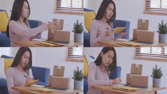 小企业主在家里检查她的订单包装和运输给她的客户。