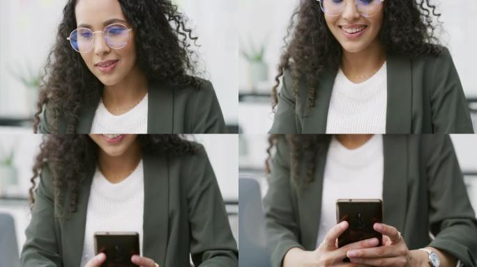 4k视频片段，一位迷人的年轻女商人独自坐在办公室里并使用手机