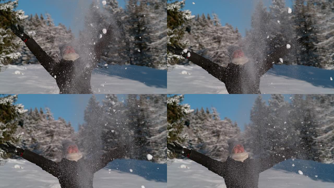 特写镜头，dop: 快乐的年轻女子将新鲜的粉末雪高高抛向空中。