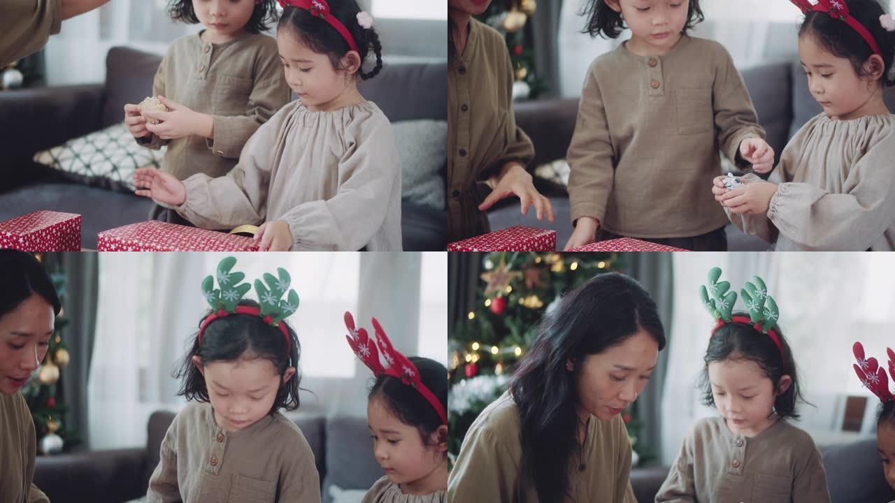 亚洲家庭创造圣诞礼物。