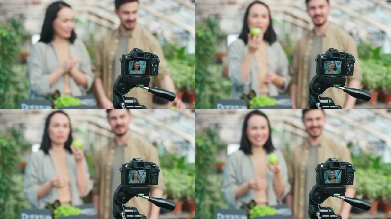 男人和女人拍摄关于新鲜农产品的Vlog