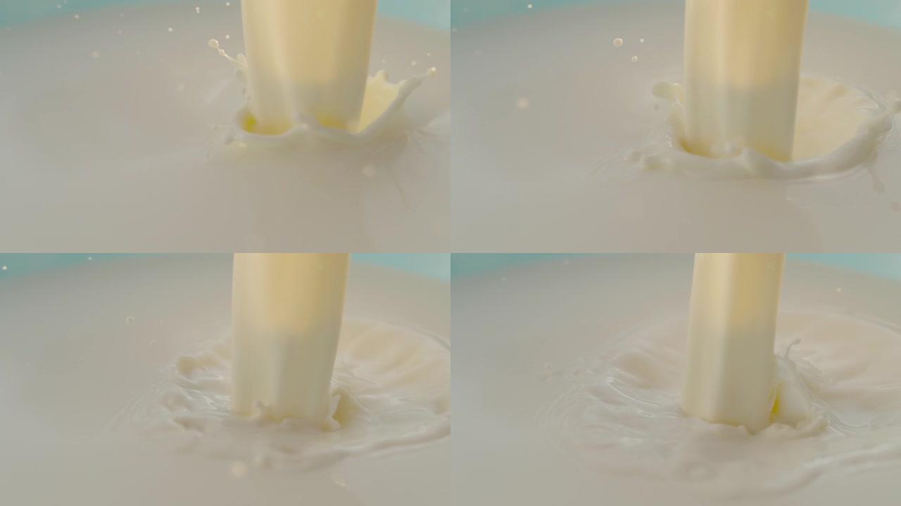 将牛奶倒入桶中的超级SLO MO时间扭曲镜头
