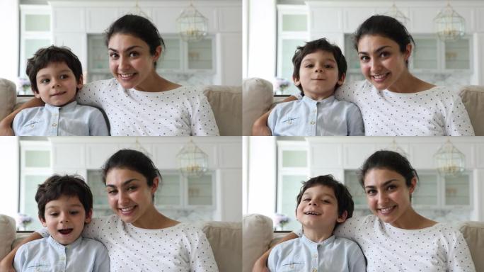 激动而快乐的印度妈妈和小男孩拥抱使视频成为焦点