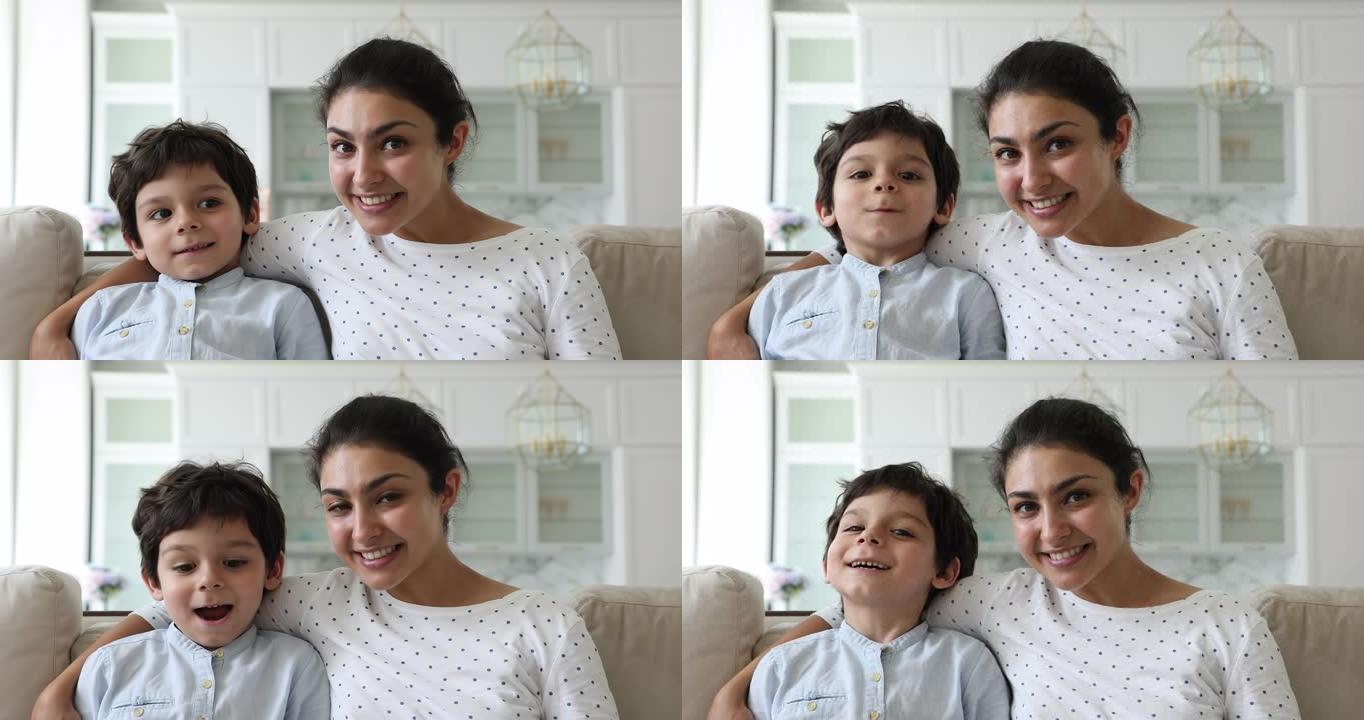 激动而快乐的印度妈妈和小男孩拥抱使视频成为焦点