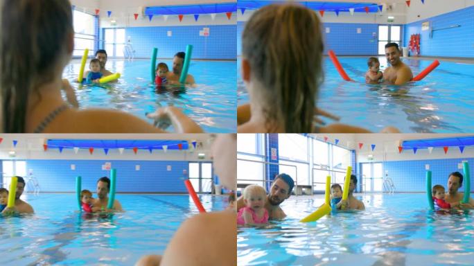 飞溅外国教练游泳池小孩学游泳夏日跳水
