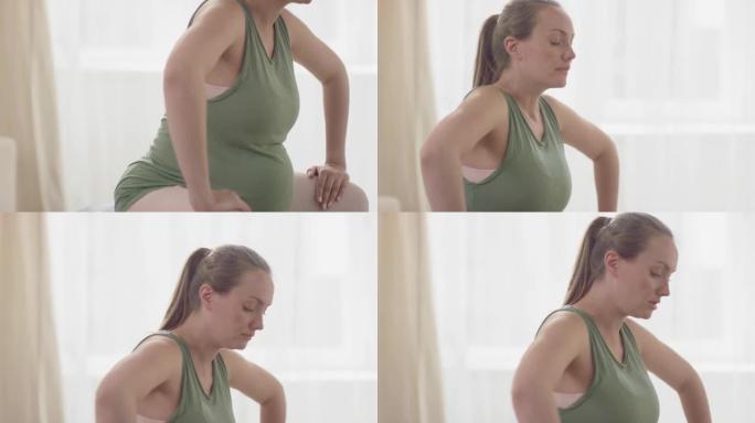 坐在Fitball上的孕妇