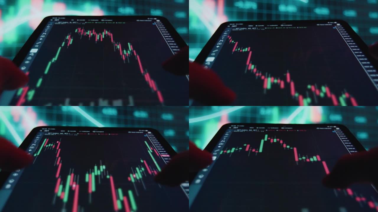 交易员在股票市场交易中使用平板电脑