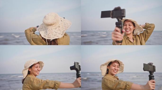旅行影响者使用相机为她的追随者拍摄海景。
