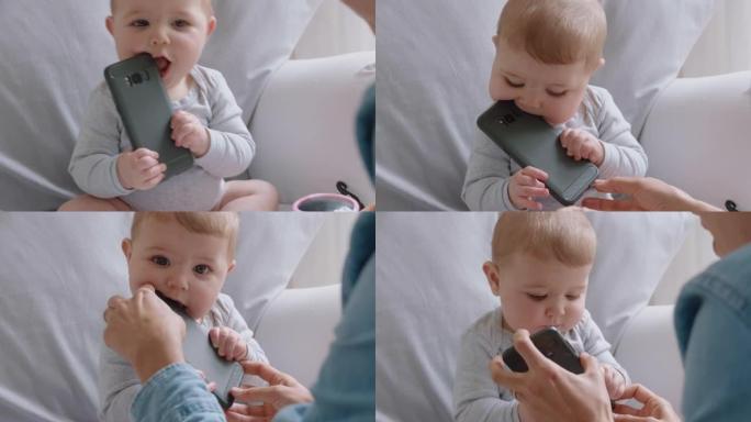 有趣的婴儿与智能手机幼儿一起玩，对在家中使用移动技术学习的婴儿感到好奇