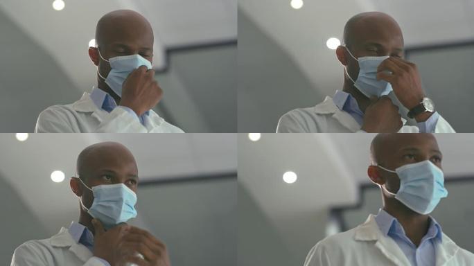 一名男性医生使用外科口罩的4k视频片段