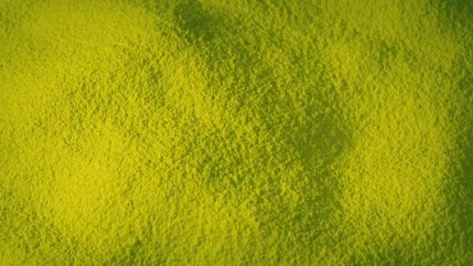 黄色化学粉末材料缓慢旋转
