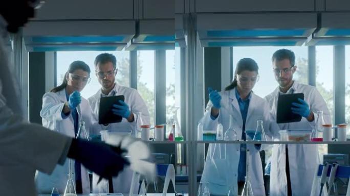 医学实验室与不同团队的生物化学研究科学家交谈，两名微生物学家使用平板电脑，微量移液器。开发药物，基因
