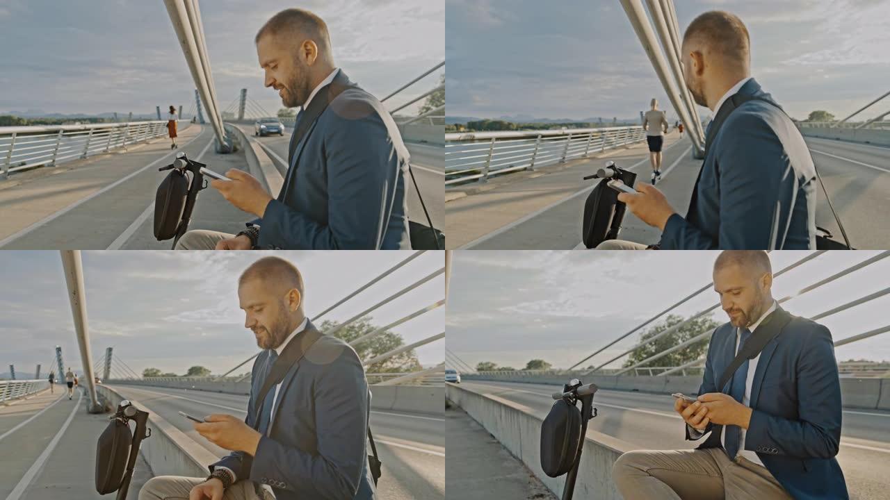 SLO MO Hipster在桥上使用他的智能手机