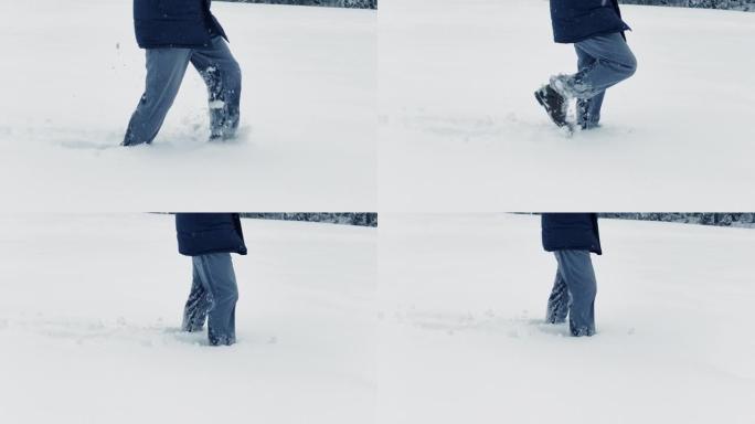 疲惫疲惫的人挣扎着在极端寒冷的雪地里行走，冬天的天气绝望无望一步一步寻找人行道