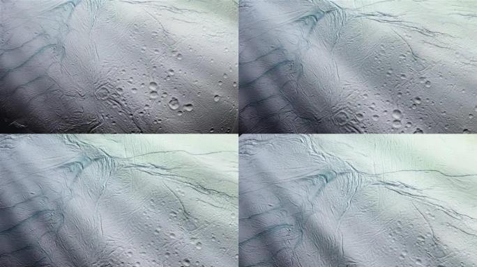冰月土卫二、土星卫星和太阳光线的表面。NASA提供的这段视频的元素。4k分辨率。