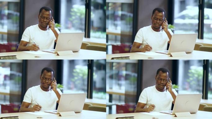 手机上的严重黑人商人