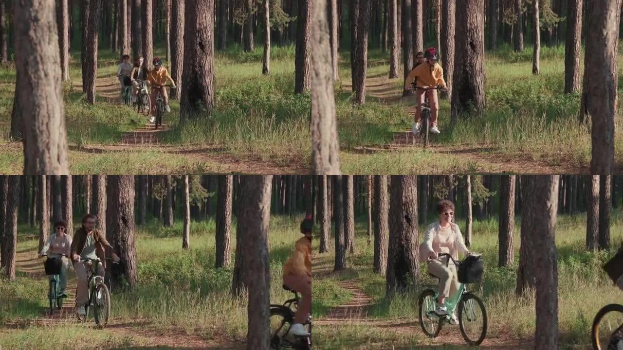 在树林中骑自行车的快乐家庭