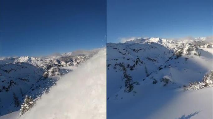 在山区积雪覆盖的斜坡上雕刻自由式滑雪板的垂直POV镜头