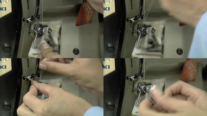 女人用手穿线缝纫机，在缝纫机上准备导线器以进行工作。特写。