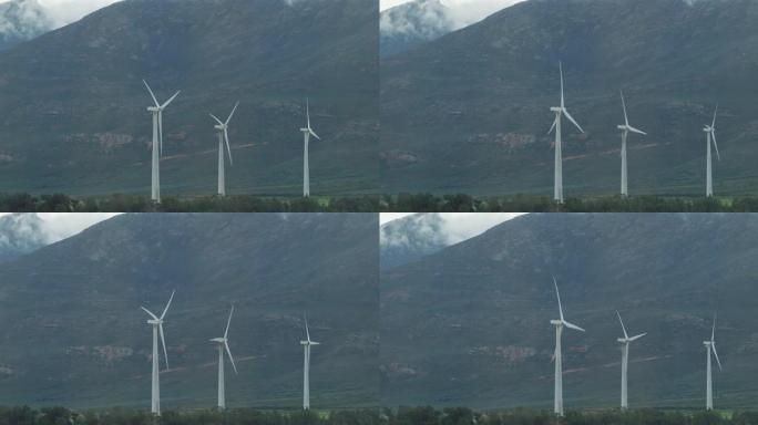 山地乡村景观中风力涡轮机的总体视图