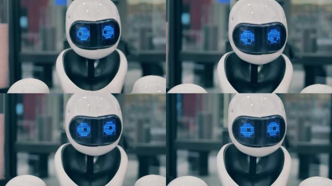 咖啡屋中高科技机器人的闪烁眼睛